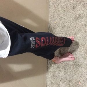 Black and red central Cass Squirrels sweatpants lose at the bottom